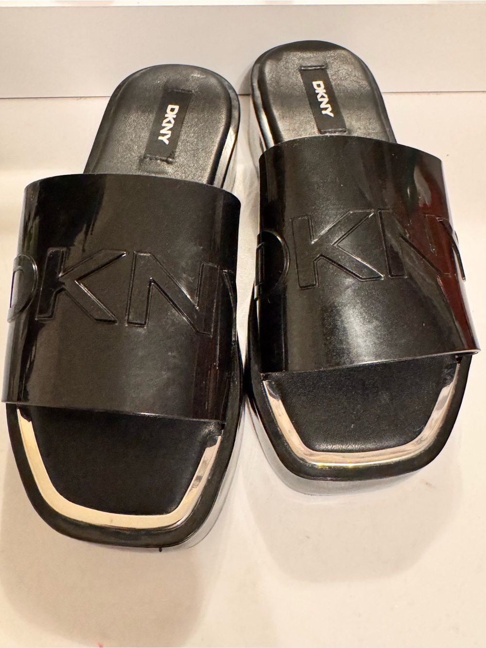 DKNY Black Patent Logo Slide Sandals with Metallic Trim
